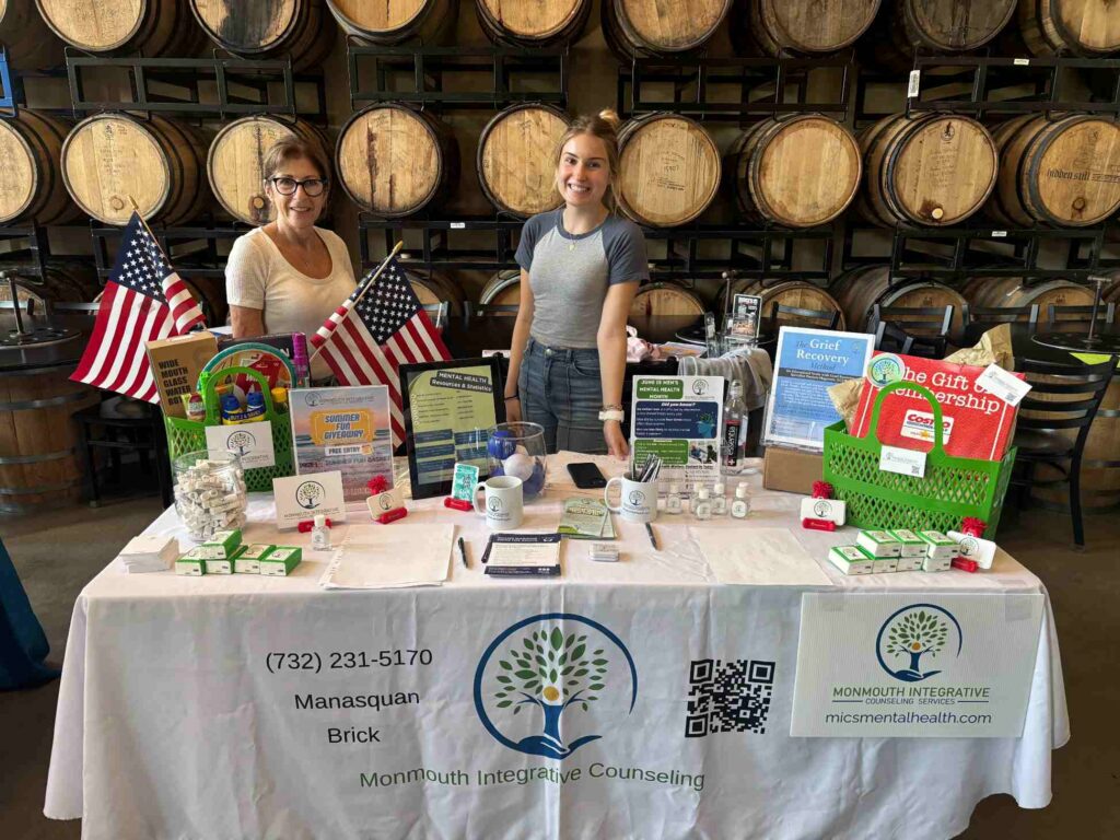 MICS team and table at the Brick Buy Brick expo
